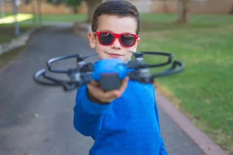 Sweet boy doing selfie using a drone Stock-Fotos