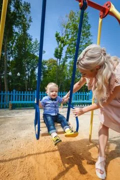 Sweet boy on swing Stock Photos