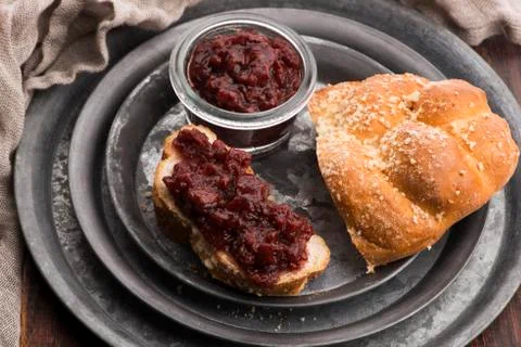 Sweet bread (challah) with cherry jam Stock Photos