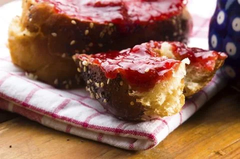 Sweet bread (challah) with strawberry jam, lodz, poland Stock Photos