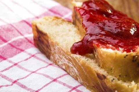 Sweet bread (challah) with strawberry jam, lodz, poland Stock Photos