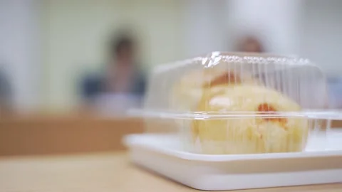 Sweet bread dessert in a plastic box Video stock 141911322
