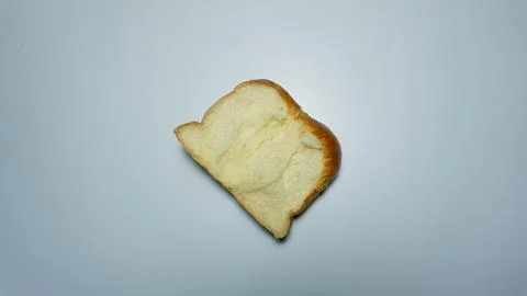 Sweet bread. Slice of sweet bread placed isolated on white background. Stock Photos