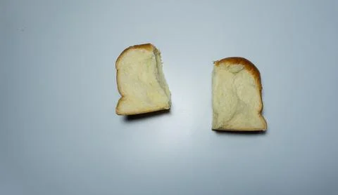 Sweet bread. Sweet bread that has been cut into two halves placed isolated .. Stock Photos
