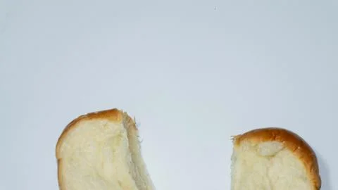 Sweet bread. Sweet bread that has been cut into two halves placed isolated .. Stock Photos