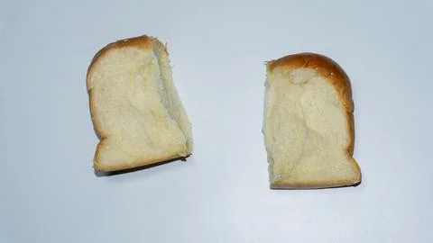 Sweet bread. Sweet bread that has been cut into two halves placed isolated .. Stock Photos