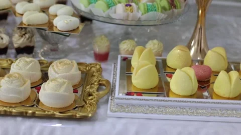 Sweet buffet, many different goodies. A sweet table at a wedding Stock Footage 288482608