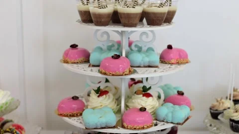Sweet buffet, many different goodies. A sweet table at a wedding Stock Footage 288482688