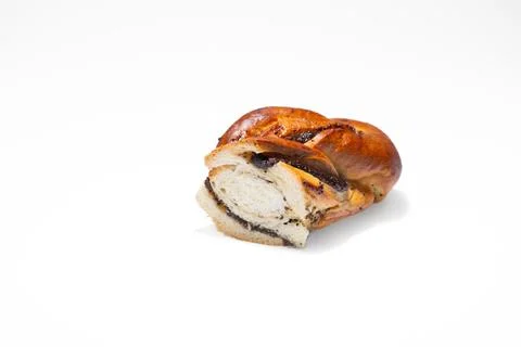 Sweet bun in a section on a white background. Vikrutas bun from Berdyansk bakery Stock Photos