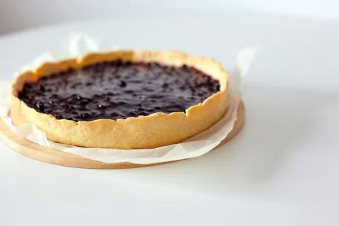 Sweet cake with black currant Stock Photos