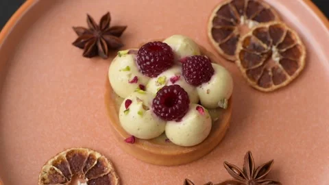 Sweet cake or tart round with cream and raspberries. Raspberry sweet tart Stock Footage 314979443