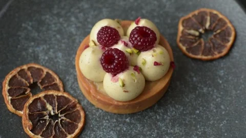 Sweet cake or tart round with cream and raspberries. Raspberry sweet tart Stock Footage 314979444