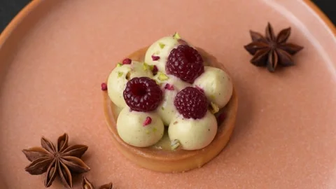 Sweet cake or tart round with cream and raspberries. Raspberry sweet tart Stock Footage 314979446