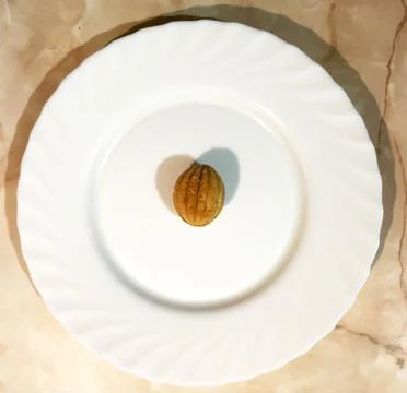 Sweet candy nut on a plate Stock Photos