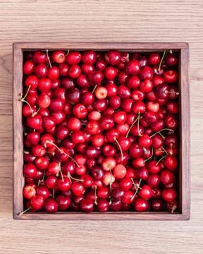 Sweet cherries in the box Stock Photos