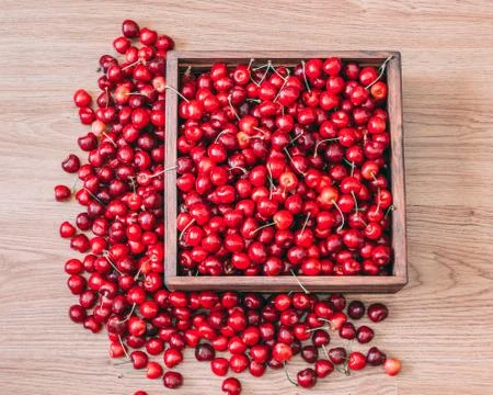 Sweet cherries in the box Stock Photos