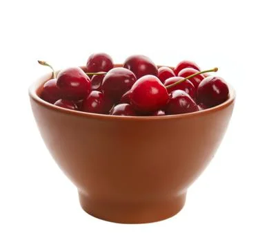 Sweet cherries in ceramic ware Фото