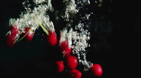 Sweet cherries flopped in water Stock Footage 39311014
