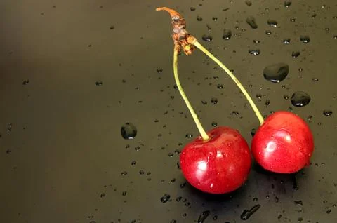 Sweet cherry on black background Stock Photos
