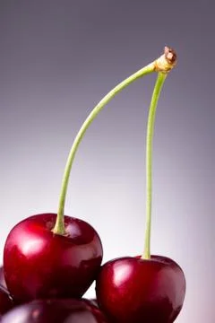 Sweet cherry on blue gradient background Foto stock