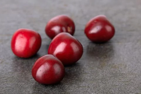 Sweet cherry on stone Stock Photos