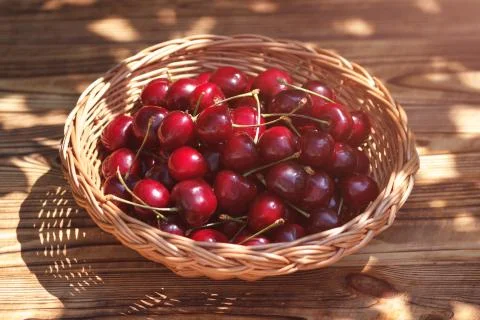 Sweet cherry on table outdoors Stock Photos