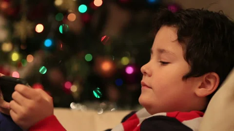 Sweet child using and playing smartphone Stock Footage 33689786