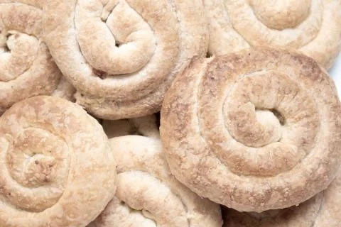 Sweet cinnamon rolls on table Stock Photos