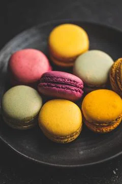 Sweet colorful macarons. Traditional french macaroons. Tasty dessert Stock Photos