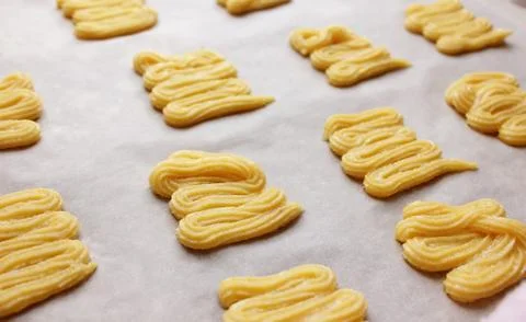 Sweet cookie dough on a baking sheet Stock Photos