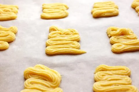 Sweet cookie dough on baking sheet Stock Photos