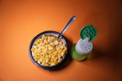 Sweet Corn : Corn kernels are small maize fruits containing a hard shell Stock Photos