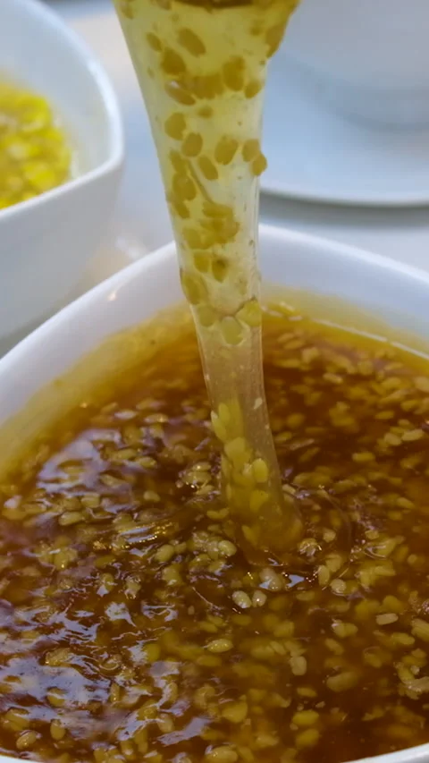 Sweet corn in slime Jelly pudding. liquid viscous additives to drinks Authentic Vídeo Stock 284920608