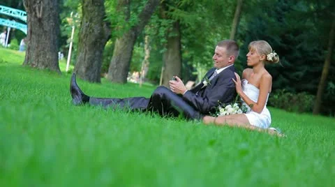 Sweet couple on the grass Stock Footage 10898026