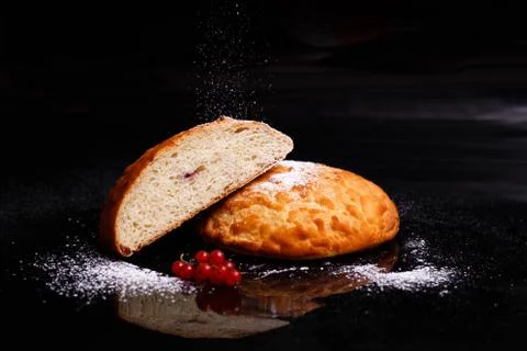Sweet cupcake in round bread shape with filling. Photo in section. Stock Photos