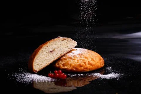 Sweet cupcake in round bread shape with filling. Photo in section. Stock Photos