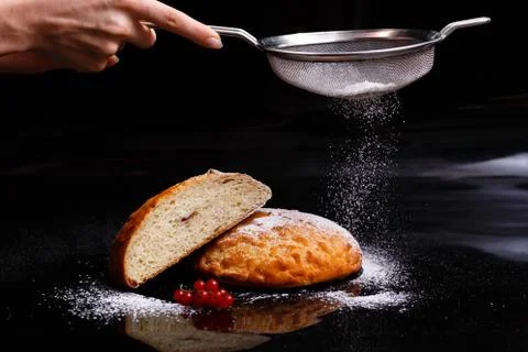 Sweet cupcake in round bread shape with filling. Photo in section. Stock Photos