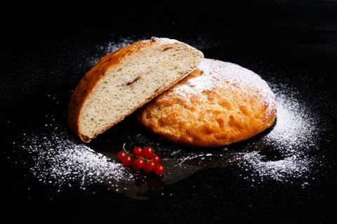 Sweet cupcake in round bread shape with filling. Photo in section. Stock Photos