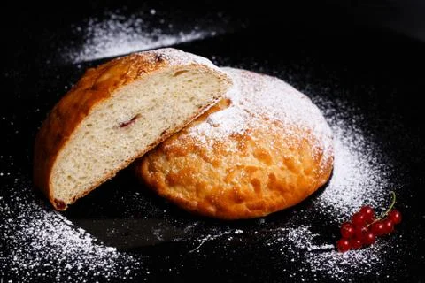 Sweet cupcake in round bread shape with filling. Photo in section. Stock Photos