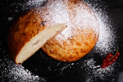 Sweet cupcake in round bread shape with filling. Photo in section. Stock Photos
