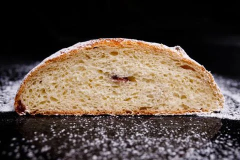 Sweet cupcake in round bread shape with filling. Photo in section. Stock Photos