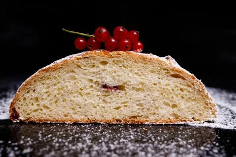 Sweet cupcake in round bread shape with filling. Photo in section. Stock Photos