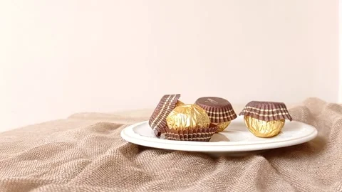 Sweet cupcakes on a brown table Stock Footage 146249290