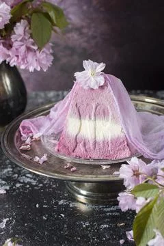 Sweet curd orthodox easter on the background of purple sakura, traditional food Stock Photos