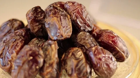 Sweet dates in a plate Stock Footage 74176993
