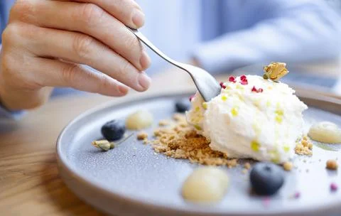 Sweet delicious dessert close-up with blueberries. Stock Photos