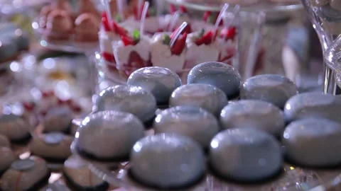 Sweet dessert at the buffet. Assorted different mini cakes with cream Stock Footage 234917286