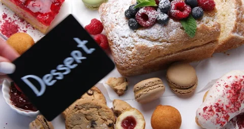 Sweet desserts table Stock Footage 236347850