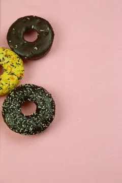 Sweet donut with colored background Stock Photos