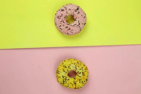 Sweet donut with colored background Stock Photos